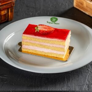 A piece of cake with strawberries